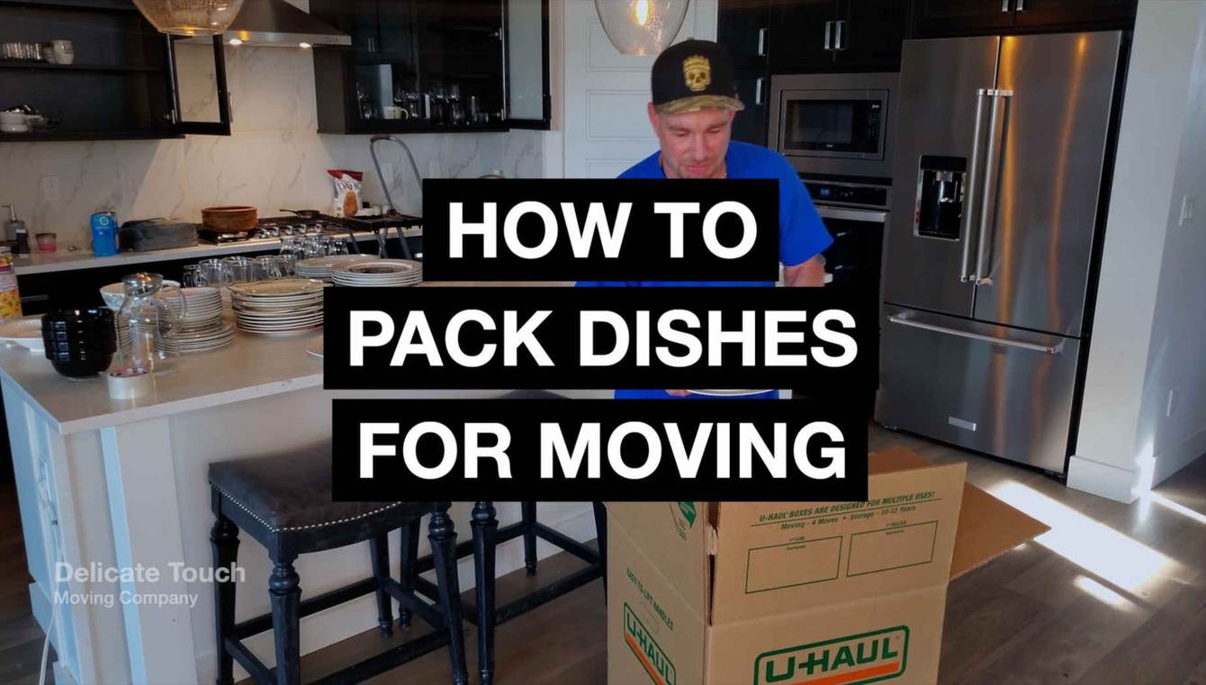 Packing paper and plates being wrapped for a move