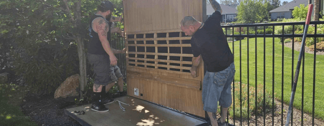 Sauna being lifted onto its base