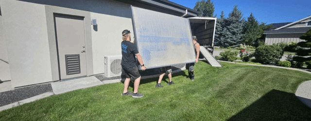 Movers reassembling the sauna